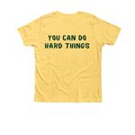 Summer 2026 Shirt- Youth Darker Font, a Heather Yellow Gold Premium Youth Tee (back-view)