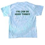 Summer 2026 Shirt- Youth Darker Font, a Lagoon Youth Tie Dye Tee (back-view)