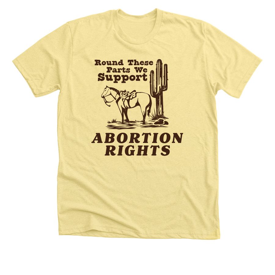 Round These Parts We Support Abortion, a Heather Yellow Gold Premium Unisex Tee