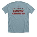 Serving up second chances, a Heather Blue Lagoon Premium Unisex Tee (back-view)