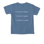 Freedom Academy Merch Sale, a Blue Jean Comfort Colors Youth Tee (back-view)