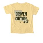 Driven By Culture, a Butter Comfort Colors Youth Tee (back-view)