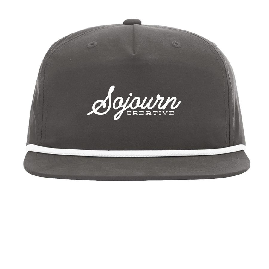 Sojourn Snapback, a Charcoal/ White Printed Umpqua Snapback Cap