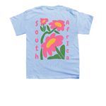 In Bloom South Africa&nbsp;, a Light Blue Youth Unisex Tee (back-view)