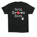 Grit Grows Here, a Vintage Black Premium Cotton Tee (back-view)