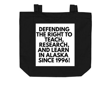UNAC 30th Anniversary Book Bag, a Black Organic Cotton Tote Bag (back-view)
