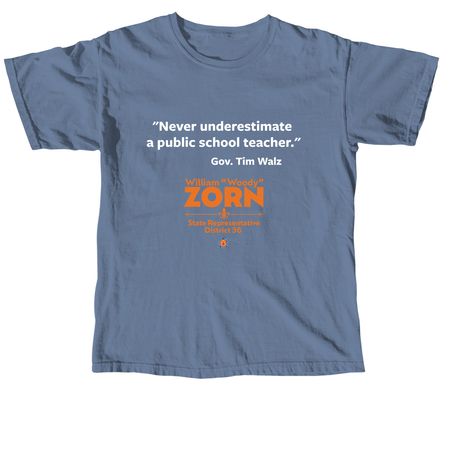 "Never underestimate public school teacher.", a Blue Jean Comfort Colors Unisex Tee