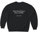 Opening Doors Since 2006, a Black Softstyle Crewneck Sweatshirt (back-view)