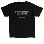 Opening Doors Since 2006, a Black Classic Unisex Tee (back-view)