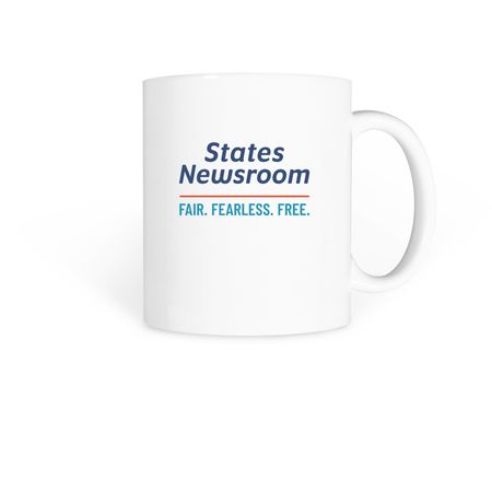Drink up the news, a White Coffee Mug