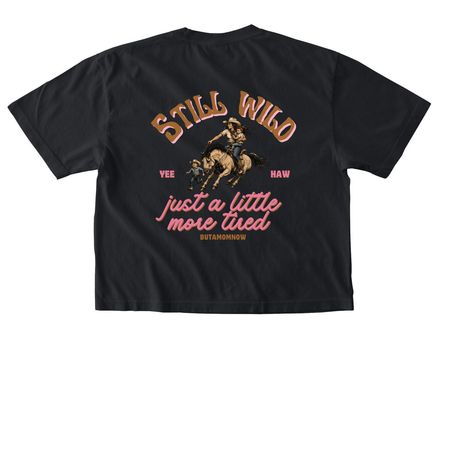 Still Wild., a Black Comfort Colors Boxy Tee