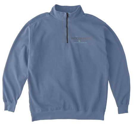 The Woodlands Foundation Logo, a Blue Jean Comfort Colors Quarter Zip Pullover